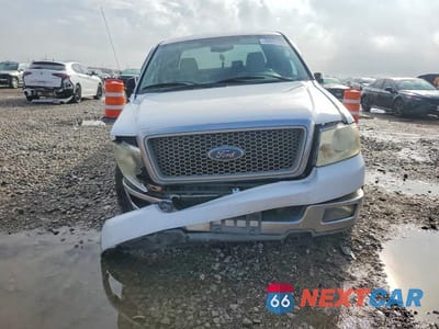 Piąte zdjęcie samochodu w środku: 2004 FORD F150 VIN:1FTPX12534NB99014 - miniatura