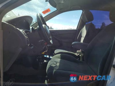 Zdjęcie 7 z 12 samochodu: 2002 FORD FOCUS ZX5 VIN:3FAFP37372R139932 - miniatura