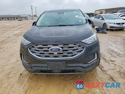 Piąte zdjęcie samochodu w środku: 2019 FORD EDGE TITANIUM VIN:2FMPK4K95KBC23093 - miniatura