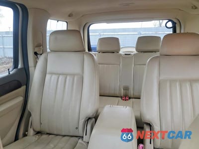 Zdjęcie 10 z 13 samochodu: 2004 LINCOLN TOWNHOUSE AVIATOR VIN:5LMEU88H24ZJ44887 - miniatura