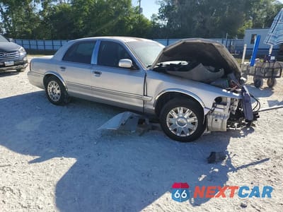 Czwarte zdjęcie samochodu z boku: 2007 MERCURY GRAND MARQUIS GS VIN:2MEFM74V47X602861 - miniatura