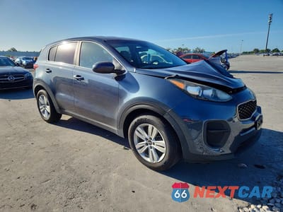 Czwarte zdjęcie samochodu z boku: 2019 KIA SPORTAGE LX VIN:KNDPM3AC2K7617097 - miniatura