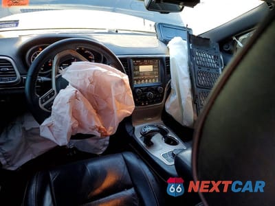 Zdjęcie 8 z 13 samochodu: 2014 JEEP GRAND CHEROKEE OVERLAND VIN:1C4RJFCM2EC329679 - miniatura