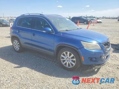 Czwarte zdjęcie samochodu z boku: 2010 VOLKSWAGEN TIGUAN SE VIN:WVGBV7AX6AW000979 - miniatura