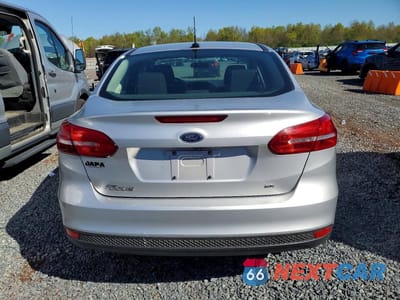 Zdjęcie 6 z 12 samochodu: 2018 FORD FOCUS SE VIN:1FADP3F29JL306661 - miniatura