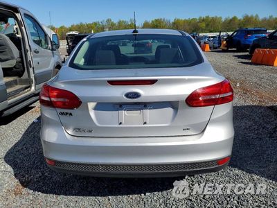 Zdjęcie 6 z 12 samochodu: 2018 FORD FOCUS SE VIN:1FADP3F29JL306661 - miniatura