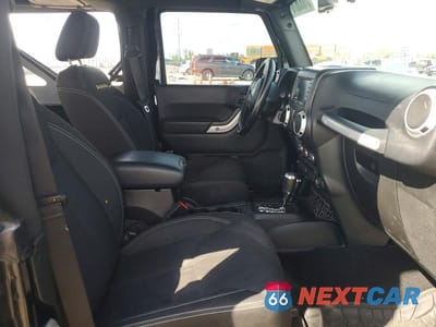 Zdjęcie 11 z 13 samochodu: 2015 JEEP WRANGLER SAHARA VIN:1C4GJWBG6FL773247 - miniatura