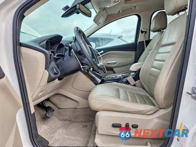 Zdjęcie 7 z 13 samochodu: 2016 FORD ESCAPE TITANIUM VIN:1FMCU0J93GUC78341 - miniatura