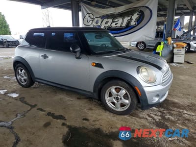 Czwarte zdjęcie samochodu z boku: 2007 MINI COOPER VIN:WMWMF33537TU60719 - miniatura