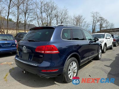 Czwarte zdjęcie samochodu z boku: 2013 VOLKSWAGEN TOUAREG V6 TDI VIN:WVGEP9BP7DD013922 - miniatura