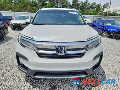 Piąte zdjęcie samochodu w środku: 2022 HONDA PILOT TOURING VIN:5FNYF5H61NB020077 - miniatura
