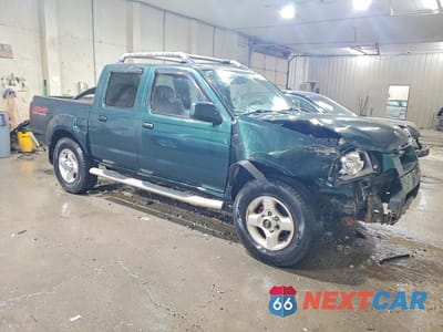 Czwarte zdjęcie samochodu z boku: 2001 NISSAN FRONTIER XE VIN:1N6ED27Y41C353517 - miniatura