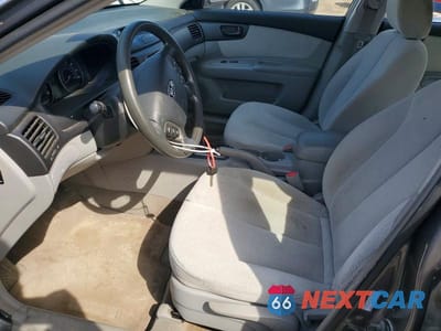 Zdjęcie 7 z 12 samochodu: 2006 KIA OPTIMA LX VIN:KNAGE123X65074614 - miniatura