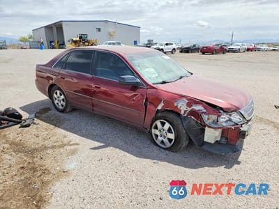 Czwarte zdjęcie samochodu z boku: 2001 TOYOTA AVALON XL VIN:4T1BF28B31U185997 - miniatura