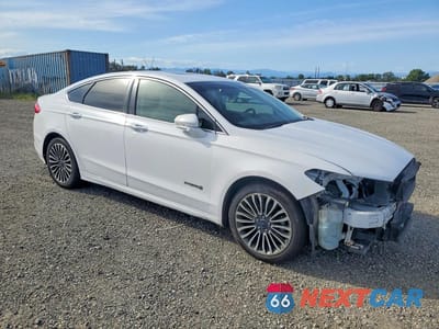 Czwarte zdjęcie samochodu z boku: 2017 FORD FUSION TITANIUM HEV VIN:3FA6P0RU1HR129698 - miniatura
