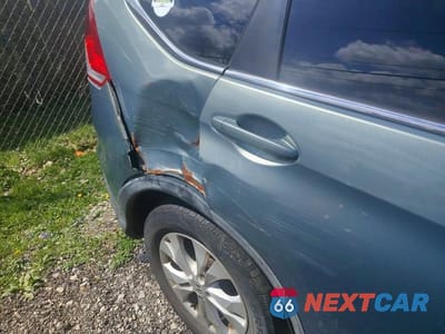 Zdjęcie 11 z 11 samochodu: 2012 HONDA CR-V EXL VIN:JHLRM4H71CC008554 - miniatura