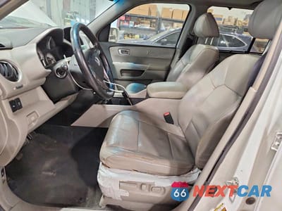 Zdjęcie 7 z 14 samochodu: 2009 HONDA PILOT TOURING VIN:5FNYF38879B020791 - miniatura