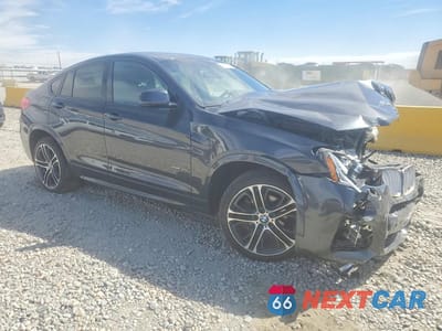 Czwarte zdjęcie samochodu z boku: 2015 BMW X4 XDRIVE35I VIN:5UXXW5C59F0E88649 - miniatura