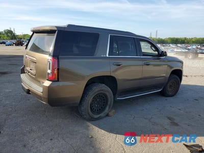 Trzecie zdjęcie samochodu z tyłu: 2016 GMC YUKON SLE VIN:1GKS1AKC6GR328052 - miniatura