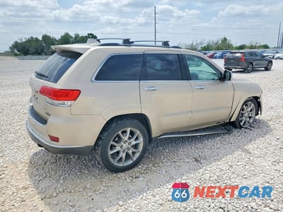 Trzecie zdjęcie samochodu z tyłu: 2014 JEEP GRAND CHEROKEE SUMMIT VIN:1C4RJFJM7EC299033 - miniatura