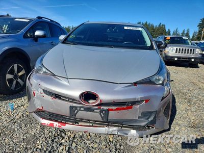Piąte zdjęcie samochodu w środku: 2017 TOYOTA PRIUS TWO VIN:JTDKBRFU8H3044842 - miniatura