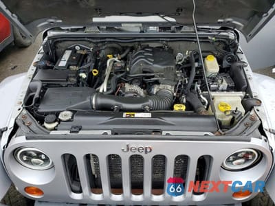 Zdjęcie 11 z 11 samochodu: 2013 JEEP WRANGLER UNLIMITED SAHARA VIN:1C4HJWEG8DL571605 - miniatura