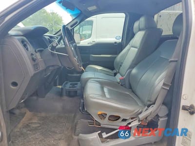 Zdjęcie 7 z 12 samochodu: 2013 FORD F150 VIN:1FTMF1CM0DKE00641 - miniatura