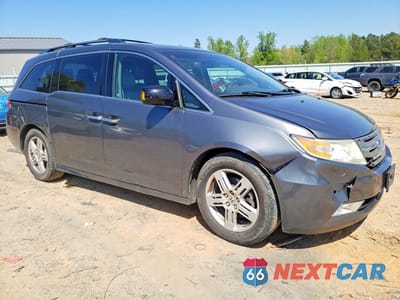 Czwarte zdjęcie samochodu z boku: 2012 HONDA ODYSSEY TOURING VIN:5FNRL5H99CB120299 - miniatura