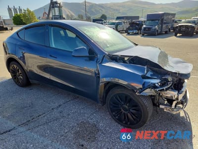 Czwarte zdjęcie samochodu z boku: 2024 TESLA MODEL Y VIN:7SAYGDEE0RA217198 - miniatura