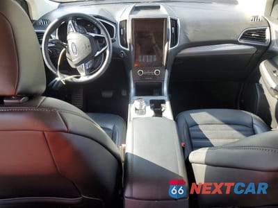 Zdjęcie 8 z 13 samochodu: 2021 FORD EDGE SEL VIN:2FMPK4J90MBA12646 - miniatura