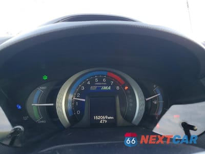 Zdjęcie 9 z 13 samochodu: 2010 HONDA INSIGHT LX VIN:JHMZE2H50AS009144 - miniatura