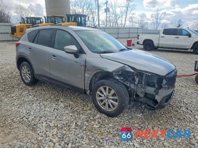 Czwarte zdjęcie samochodu z boku: 2015 MAZDA CX-5 TOURING VIN:JM3KE4CY5F0552791 - miniatura