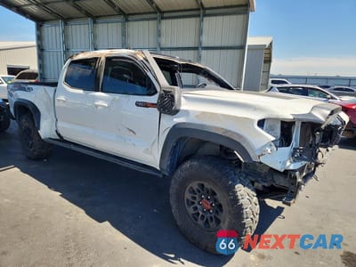 Czwarte zdjęcie samochodu z boku: 2019 TOYOTA TACOMA TRD OFF-ROAD VIN:3TMDZ5BN0KM073043 - miniatura