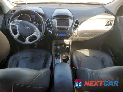 Zdjęcie 8 z 13 samochodu: 2013 HYUNDAI TUCSON LIMITED VIN:KM8JUCAC8DU727965 - miniatura