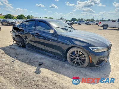 Czwarte zdjęcie samochodu z boku: 2021 BMW M340I VIN:WBA5U7C05MFK99886 - miniatura