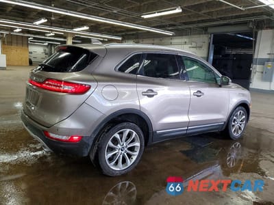 Trzecie zdjęcie samochodu z tyłu: 2019 LINCOLN MKC SELECT VIN:5LMCJ2C96KUL39799 - miniatura