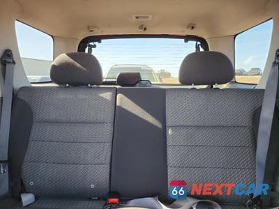 Zdjęcie 10 z 12 samochodu: 2003 FORD ESCAPE XLT VIN:1FMYU93133KA22143 - miniatura