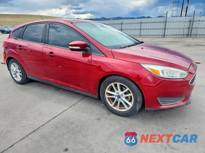 Czwarte zdjęcie samochodu z boku: 2016 FORD FOCUS SE VIN:1FADP3K2XGL262507 - miniatura