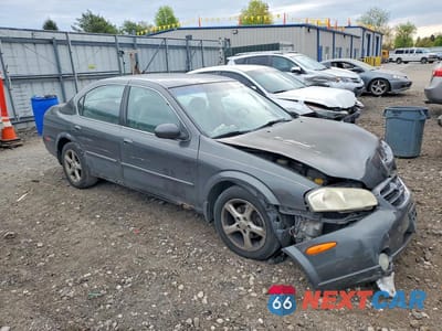 Czwarte zdjęcie samochodu z boku: 2001 NISSAN MAXIMA GXE VIN:JN1CA31D01T615244 - miniatura