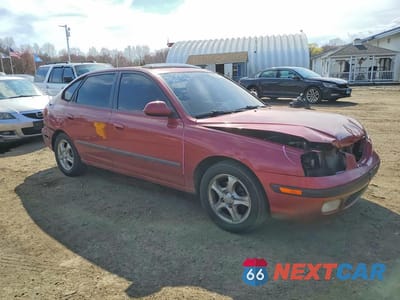 Czwarte zdjęcie samochodu z boku: 2003 HYUNDAI ELANTRA GT VIN:KMHDN55DX3U083523 - miniatura