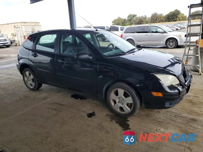 Czwarte zdjęcie samochodu z boku: 2006 FORD FOCUS ZX5 VIN:1FAHP37N66W199262 - miniatura
