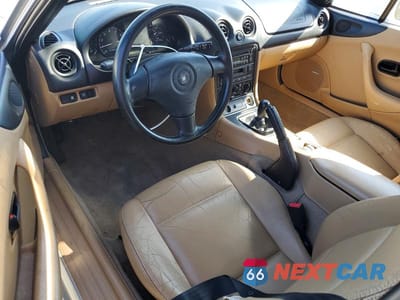 Zdjęcie 8 z 12 samochodu: 1999 MAZDA MX-5 MIATA VIN:JM1NB3539X0122029 - miniatura
