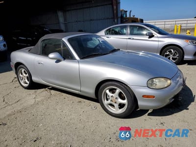 Czwarte zdjęcie samochodu z boku: 1999 MAZDA MX-5 MIATA VIN:JM1NB3539X0122029 - miniatura