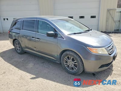 Czwarte zdjęcie samochodu z boku: 2011 HONDA ODYSSEY VIN:5FNRL5H64BB060193 - miniatura