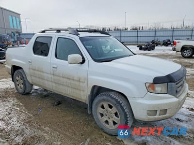 Czwarte zdjęcie samochodu z boku: 2009 HONDA RIDGELINE RTL VIN:2HJYK16549H001842 - miniatura