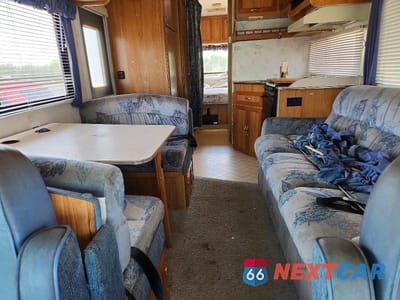 Zdjęcie 6 z 10 samochodu: 1997 FORD ECONOLINE E450 SUPER DUTY CUTAWAY VAN RV VIN:1FDLE40S2VHB27859 - miniatura