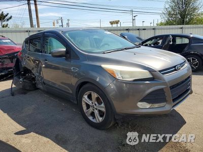 Czwarte zdjęcie samochodu z boku: 2014 FORD ESCAPE SE VIN:1FMCU0GX6EUC02387 - miniatura