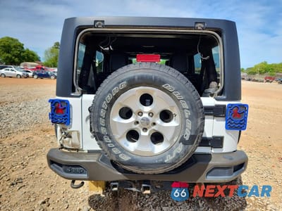 Zdjęcie 6 z 14 samochodu: 2016 JEEP WRANGLER UNLIMITED SAHARA VIN:1C4BJWEG2GL338183 - miniatura