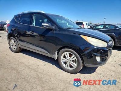 Czwarte zdjęcie samochodu z boku: 2013 HYUNDAI TUCSON GLS VIN:KM8JUCAC3DU678934 - miniatura