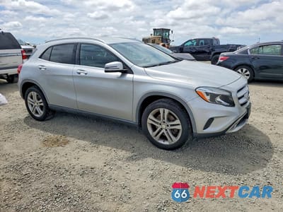 Czwarte zdjęcie samochodu z boku: 2015 MERCEDES-BENZ GLA 250 4MATIC VIN:WDCTG4GB7FJ094415 - miniatura